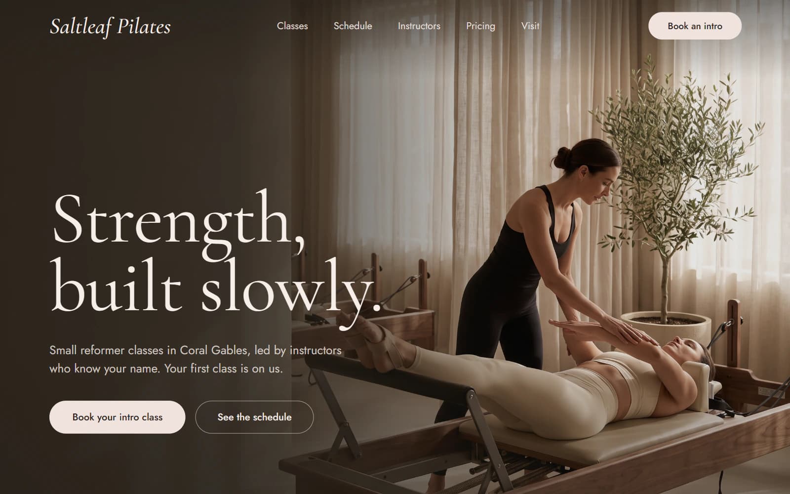 Example redesigned homepage for Saltleaf Pilates, a fictional studio in Coral Gables: the headline “Strength, built slowly.” over a photo of an instructor guiding a client on a reformer, with buttons to book an intro class and see the schedule.